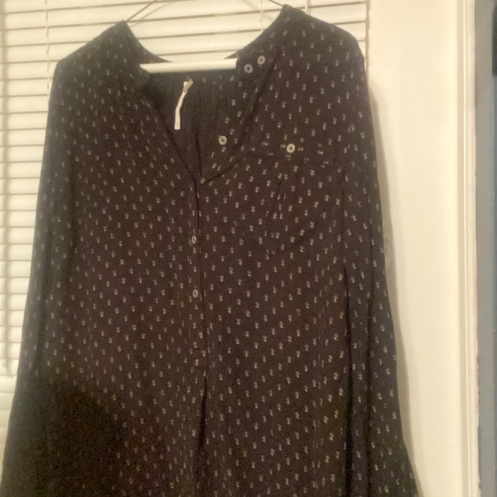 Free People button down shirt XS runs a little oversized.